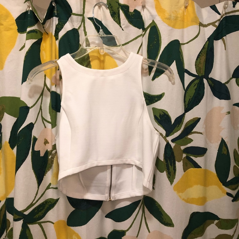 White crop top with zipper detail in the back